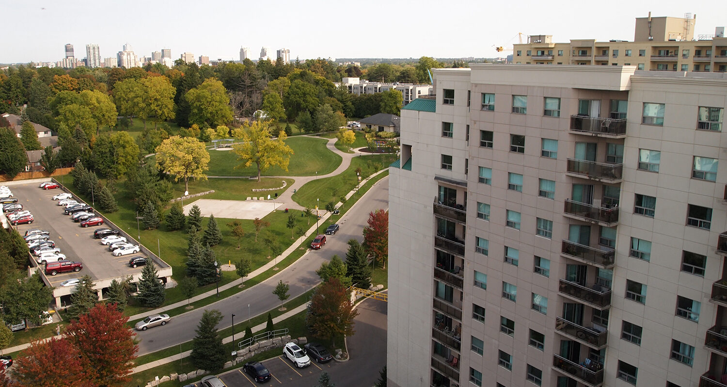 A park near Pineridge Place, and apartment building in London, Ontario