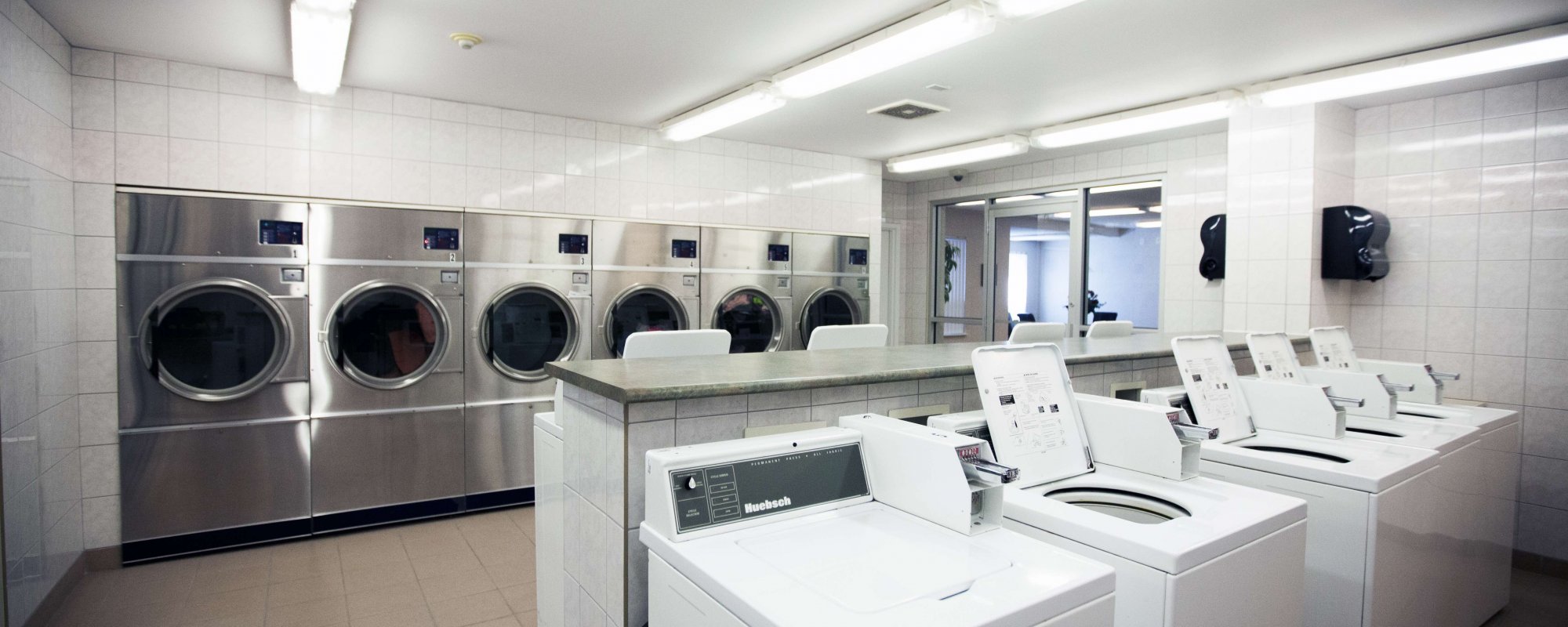 Laundry facilities at a Proudfoot Place apartment building